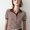 Baumwoll-Poloshirt mit gestreiften Details Baumwoll-Poloshirt mit gestreiften Details
