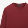 Baumwollstrickpullover mit Rundhalsausschnitt Baumwollstrickpullover mit Rundhalsausschnitt