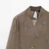Bestickte, halbtransparente Bluse Bestickte, halbtransparente Bluse