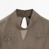 Bestickte, halbtransparente Bluse Bestickte, halbtransparente Bluse