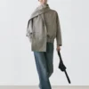 Bomberjacke mit Fleckeneffekt und Schals Bomberjacke mit Fleckeneffekt und Schals
