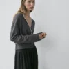 Cardigan im Wickelstil mit Spitzendetails Cardigan im Wickelstil mit Spitzendetails