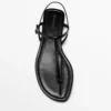 Flache Riemchensandalen mit Zehentrenner Flache Riemchensandalen mit Zehentrenner