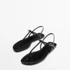 Flache Riemchensandalen mit Zehentrenner Flache Riemchensandalen mit Zehentrenner