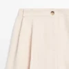 Fließende Hose mit umgeschlagenen Säumen Fließende Hose mit umgeschlagenen Säumen