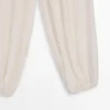 Fließende Sarouel-Hose mit Plissee-Detail Fließende Sarouel-Hose mit Plissee-Detail