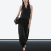 Halbtransparente Sarouel-Hose mit Knopfdetails Halbtransparente Sarouel-Hose mit Knopfdetails