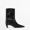 Leder-Stiefeletten mit hohem Absatz