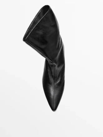 Leder-Stiefeletten mit hohem Absatz Leder-Stiefeletten mit hohem Absatz