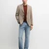 Maßgeschneiderter Leinen-Blazer mit Taschendetails Maßgeschneiderter Leinen-Blazer mit Taschendetails