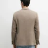 Maßgeschneiderter Leinen-Blazer mit Taschendetails Maßgeschneiderter Leinen-Blazer mit Taschendetails