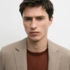 Maßgeschneiderter Leinen-Blazer mit Taschendetails Maßgeschneiderter Leinen-Blazer mit Taschendetails