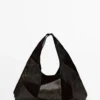 Mittelgroße Patchwork-Tasche aus Wildleder Mittelgroße Patchwork-Tasche aus Wildleder