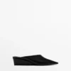Mules mit Keilabsatz Mules mit Keilabsatz