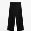 Plissierte Hose aus extrafeiner Wolle Plissierte Hose aus extrafeiner Wolle