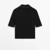 Poloshirt aus Baumwollstrick mit Kontrastdetails Poloshirt aus Baumwollstrick mit Kontrastdetails