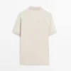 Poloshirt aus mikrostrukturierter Baumwollpiqué Poloshirt aus mikrostrukturierter Baumwollpiqué