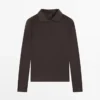 Poloshirt mit Schulterpolstern Poloshirt mit Schulterpolstern