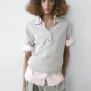 Pullover aus Baumwollstrick mit Poloshirt-Ausschnitt Pullover aus Baumwollstrick mit Poloshirt-Ausschnitt