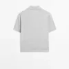 Pullover aus Baumwollstrick mit Poloshirt-Ausschnitt Pullover aus Baumwollstrick mit Poloshirt-Ausschnitt