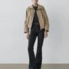 Skinny-Jeans mit hoher Taille und ausgestelltem Bein Skinny-Jeans mit hoher Taille und ausgestelltem Bein