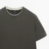 T-Shirt aus 100 % Baumwolle mit kontrastierendem Ausschnitt T-Shirt aus 100 % Baumwolle mit kontrastierendem Ausschnitt