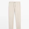 Total Look-Leinenhose mit Taillendetail Total Look-Leinenhose mit Taillendetail