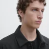 Trenchcoat aus wasserabweisendem Material Trenchcoat aus wasserabweisendem Material