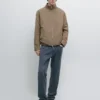 Wasserabweisende Daunenjacke mit hohem Kragen Wasserabweisende Daunenjacke mit hohem Kragen
