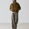 Weit geschnittene Hose mit gestreiften Details Weit geschnittene Hose mit gestreiften Details