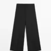 Weit geschnittene, verkürzte Stretch-Woll-Hose Weit geschnittene, verkürzte Stretch-Woll-Hose
