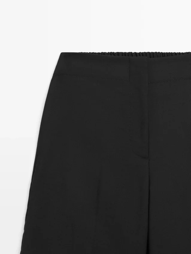 Weit geschnittene, verkürzte Stretch-Woll-Hose Weit geschnittene, verkürzte Stretch-Woll-Hose