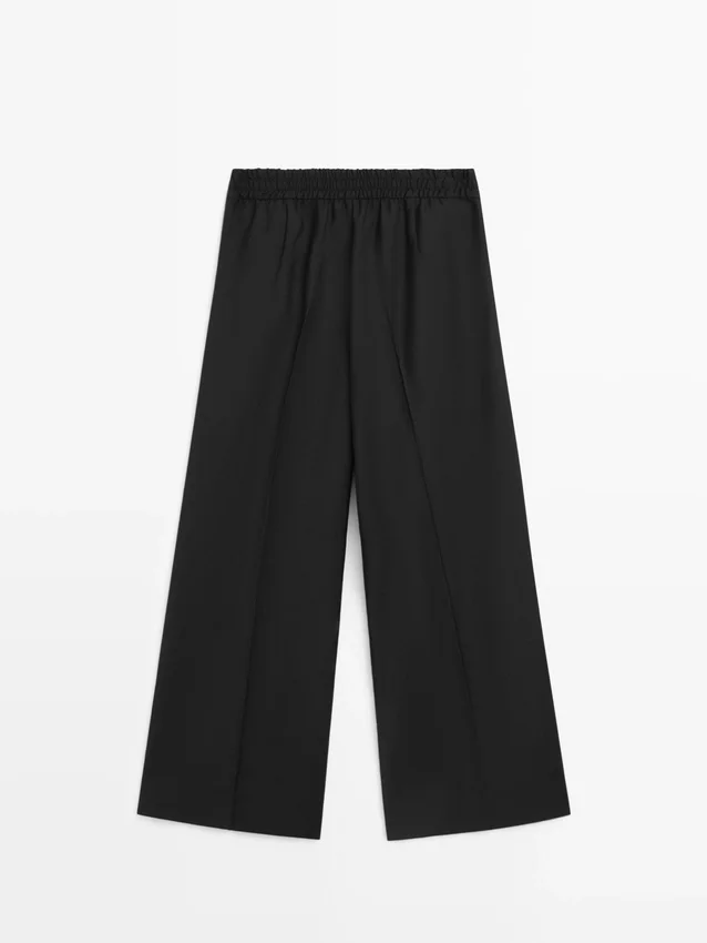 Weit geschnittene, verkürzte Stretch-Woll-Hose Weit geschnittene, verkürzte Stretch-Woll-Hose