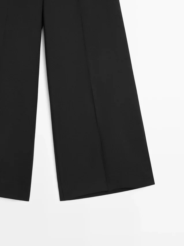 Weit geschnittene, verkürzte Stretch-Woll-Hose Weit geschnittene, verkürzte Stretch-Woll-Hose